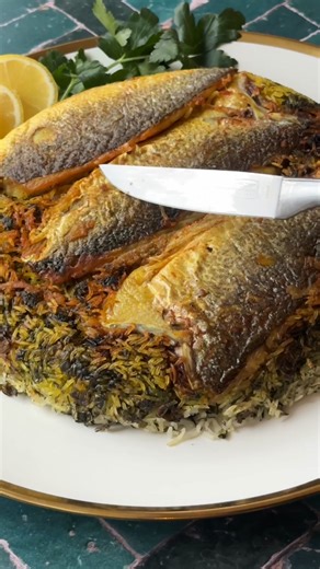 Check the recipe here https://www.unicornsinthekitchen.com/fish-tahdig/ This fish tahdig recipe combines the finest elements of Persian cuisine—a fragrant, herb-infused rice dish alongside crispy, golden white fish. Perfect for Nowruz (Persian New Year) or a cozy dinner, this dish is sure to delight any crowd! | Unicorns in the Kitchen