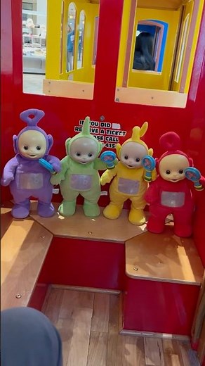 Teletubbies riding on the train