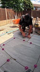 Laying Porcelain Tiles ⚒️⚒️ #landscaping #patio #howto #tips #diy #fypシ | LNC Landscapes and Paving