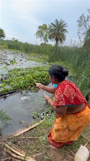 Beautiful lady fisherman catching catfishing in village big pond #bass #fish #villagelife #fishing