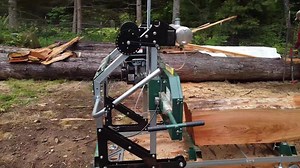 Mike's enjoying his new 122! #hm122 #sawmill #woodlandmills #drone #droneshots #woodworking #sawmill #discoverthewoodland #sawdust #lumber @sawmillmikes | Woodland Mills
