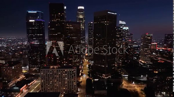 Los Angeles downtown skyline at night with illuminated skyscrapers, August 10 2025