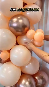 Take your balloon garlands to the next level with these 4 ways to incorporate 5-inch balloons! 🎈 ✨Glue Dots: Use glue dots for a quick and precise placement. They’re perfect for adding single 5-inch balloons exactly where you need a pop of color or extra volume. ✨260 Balloon for One Cluster: Wrap a 260 balloon around a cluster of 5-inch balloons to integrate them smoothly into your garland. ✨260 Balloon for Two Clusters: Link two clusters of 5-inch balloons together using a 260 balloon. This me