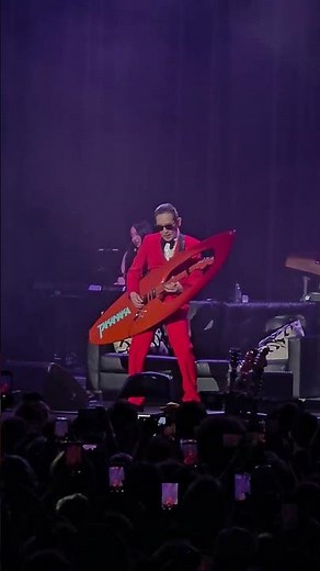 The legendary Masayoshi Takanaka shredding on his surfboard guitar.