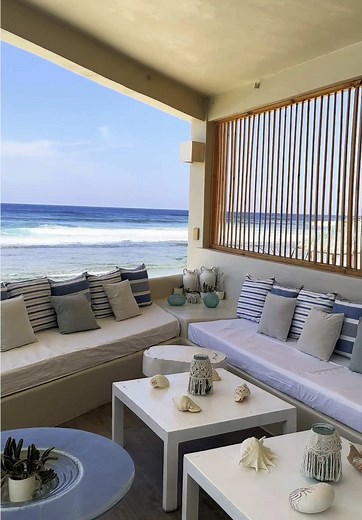 Experience Tranquil Mornings at Sundowners Beach Mansion