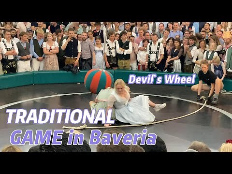Traditional Game in Bavaria, Germany. Devil's Wheel Challenge: Oktoberfest Thrills & Tradition