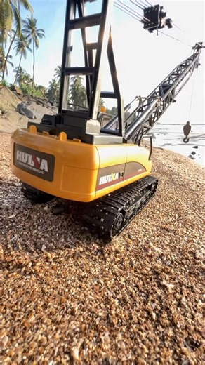 Ashraf Shaikh – Daddy Drones | RC & Toys on Instagram: "Huina 1572 RC Crane 🔥 Precision. Power. Perfection. Beach meets machine 🌊🏗️ The Huina 1572 is a 1:14-scale remote-control heavy-duty dump truck, built with a metal/ABS alloy body, designed to replicate real construction equipment in RC form. Key features: • Realistic alloy/metal body and rubber tyres for durability and “adult-hobby” quality. ￼ • 2.4 GHz remote control system (10-channel) giving interference-free control up to about 30 me