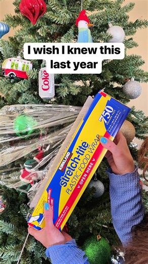 This saves me time Liz uses plastic wrap to easily pack up and store her christmas tree until next year. This original video was produced by Network Media LLC, and Liz & Jeff. #christmastree #treestorage #storage #afterchristmas | Home Hacks & Easy Snacks