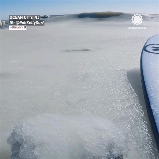 Slurpee waves form when ocean water hovers near freezing and the wind keeps it moving. And yes — he’s actually surfing it. 🥤🏄‍♂️ | AccuWeather