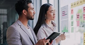 Tablet, planning and business people on glass for project timeline, calendar and sticky note with teamwork. Digital technology, project schedule and woman writing on window with scrum and agile ideas Stock Video