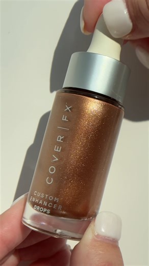 Meet your glow-to ✨ One drop of the Custom Enhancer Drops in the shade Candlelight transforms any product into a radiant, lit-from-within finish. Shop it here: https://bit.ly/46pbZ39 | Cover FX