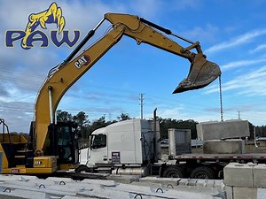 PAW Materials - Loading Concrete Precast Bin Blocks, Excavator View