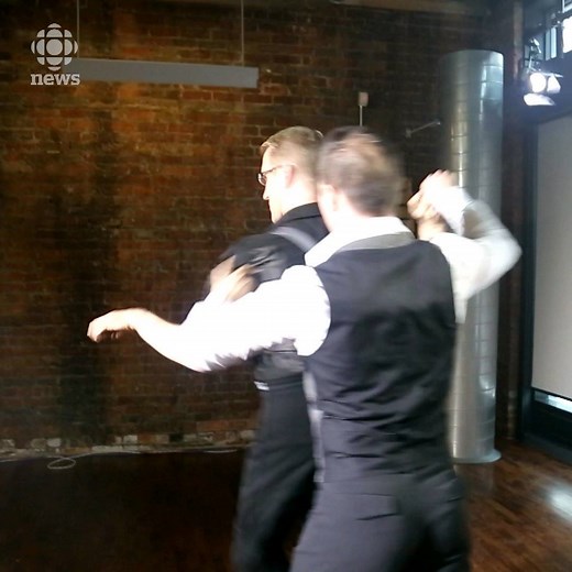 Jeff Fox and Trevor Copp teach a dance style where both partners take the lead. They call it liquid leading. The gender-neutral, inclusive dance is designed so the lead switches between partners. | CBC News