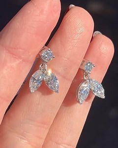5.2K views | Mermaid Tail Dangling Stud Earrings in 18karat white...