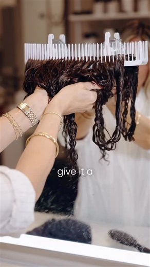 Orahhair | Pro Extensions Only on Instagram: "Prepping Super Curl for install 🤍 A little moisture, gentle handling, and letting the curl do its thing makes all the difference. When Super Curl is prepped properly, the definition stays intact and the install goes smoother from start to finish. Shown here in Espresso and Truffle, ready and waiting."