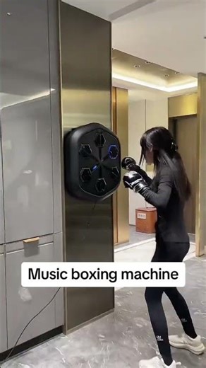 Pure rhythm boxing satisfaction! 🥊🎵 Watch the Music Boxing Machine in action