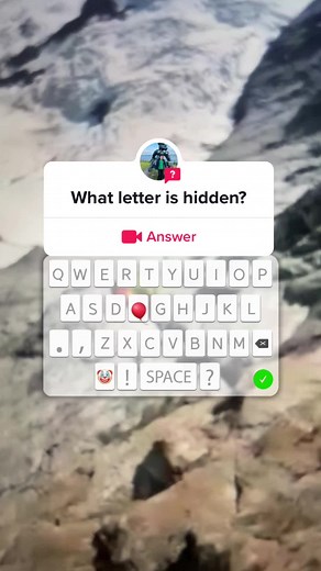 Hidden Letter Puzzle in Snowy Mountain Landscape