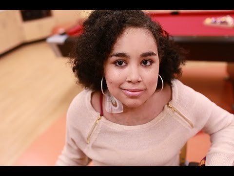 Young Woman Carries Her Heart in a Backpack, with a Little Help from Her Friends