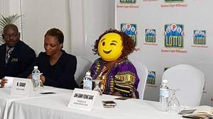 Jamaican Lottery Winner Shows Up in Emoji Mask to Accept $180 Million Prize