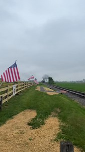 Strasburg railroad #90 coasts past the Red Caboose Motel’s line of American Flags on its way to East Strasburg Station. 90 is an ex-Great Western 2-10-0 decapod steam locomotive, built by the Baldwin Locomotive Works in 1924. Taken at the Strasburg Railroad on June 14th 2025. #steamtrain #steamlocomotive #railroad #train #trainnerds | Rail Brothers
