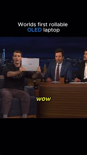 Profit Scene on Instagram: "Linus Tech Tips went on Jimmy Fallon to showcase something that barley feels real: a Lenovo laptop with a rollable OLED display. Folded, it looks like a normal 14-inch notebook. Press a button and the screen rises upward into a taller, expanded workspace Follow @profitscene for more #business #trending #breakthroughs #innovate #entrepreneurship"