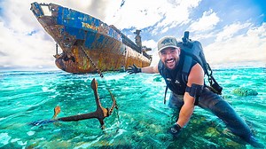 Exploring an abandoned ghost ship on a reef