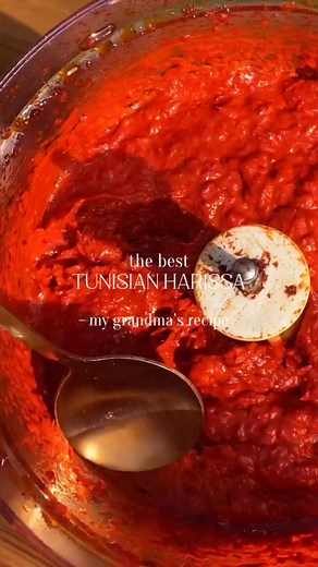 TUNISIAN HARISSA🌶️ by itsvegansis Sharing with you one of my Tunisian grandma’s favorite recipes- Harissa! It’s the PERFECT spicy addition to every dish! From sandwiches to sauces harissa has you covered🫡 INGREDIENTS: - 200 g sweet dried red chiles - 100 g spicy dried red chiles - Lukewarm water (not boiling!) - Garlic cloves from 2 garlic heads - 1 cup oil - 2 tbsp paprika - 1 tbsp salt INSTRUCTIONS: Start by putting on some gloves (very important). Remove the top of the peppers and cut along