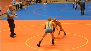 Wrestling in a low cut singlet