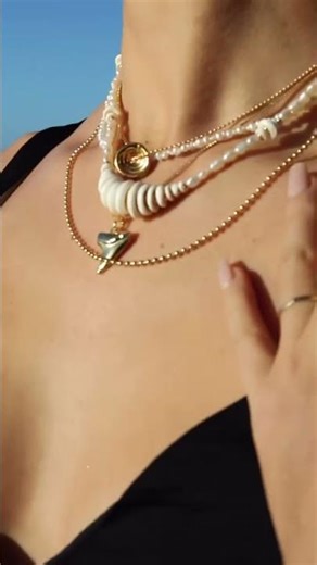 The ultimate duo: Raw puka shells and shimmering gold