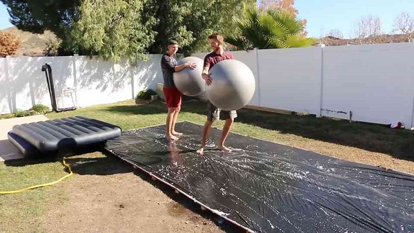 GIANT Slip N' Slide Jousting!!