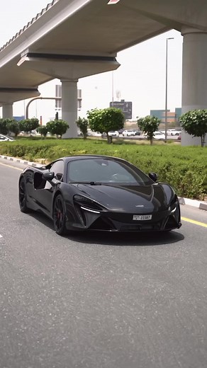 McLaren Artura - Roaring through the asphalt jungle ⚡️🚀 0-100 KM/H - 3.0 sec Top speed - 320 BHP - 671 Engine - 3.0L V6 Twin Turbocharged ⚡️ For booking contact or WhatsApp us 📲 #mclaren #mclarenartura #dubai🇦🇪 #supercarrental #luxurycars #exoticcars #luxury #showroom #dubaitiktok #hypercar #rental