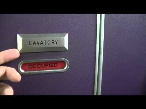 How to open an airplane's inside locked lavatory door from outside?