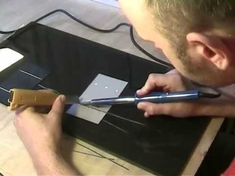 how to solder tabbing wire to solar cells.wmv