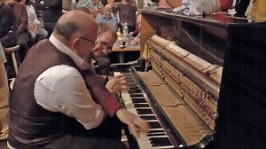 Two Boogie-Woogie Legends Entertain Pub by Playing the Same Piano