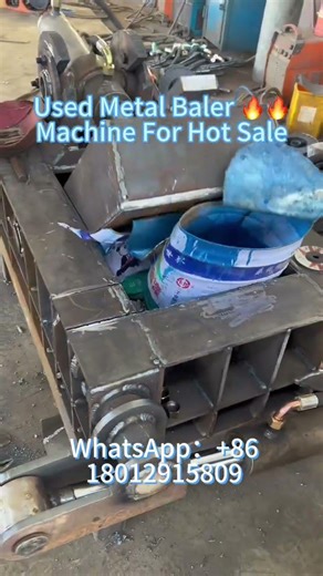 Prioritize operator safety with this safety-equipped used large hydraulic baler