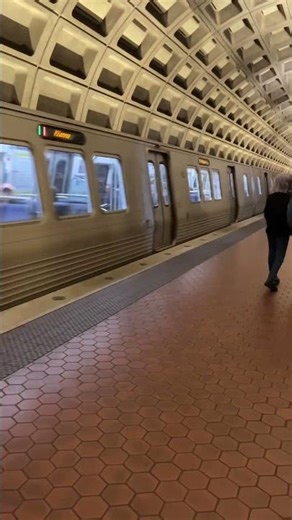 WMATA Metro 7k series Orange Line train leaving Foggy Bottom-GWU Station