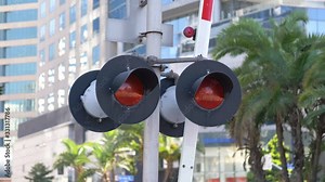 Railroad Crossing Train Sign and flashing lights in 4K Slow motion 60fps