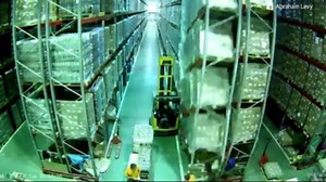 Forklift driver’s mishap causes warehouse shelves to tumble like dominoes