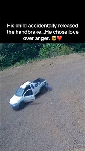 His child accidentally released the handbrake…He chose love over anger. 🥹❤️
