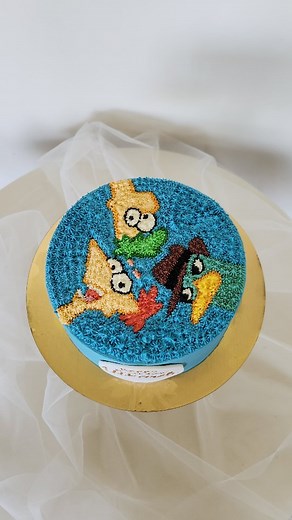 Wait for it! 😉 Here's what 1 hour of continuous piping looks like in 40 seconds 🤪😉 #phineasandferb Following my Hello Kitty Cake success, I challenged myself with a more complicated image and a lot of colours! 🙈 To make it more challenging for myself, I only had two piping tips in the same size, so I had to change the bag and clean the piping tips A LOT 🤪😄 (Skip this step if you can 😉) I do, however, love how nearly all cartoon images can be piped onto a cake using this technique. It's a 