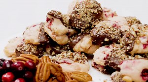 Recipe: Cranberry cookies dipped in chocolate & pecans