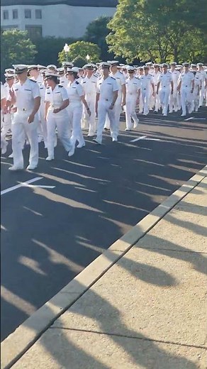 Midshipmen march in a procession as 2023 Graduation Ceremony begins