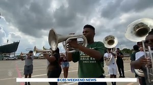Brandon Fisher, a high school senior on the autism spectrum, is overcoming challenges by marching to his own beat with hopes to help people better understand autism along the way. https://cbsn.ws/3pU8wTH | CBS Evening News