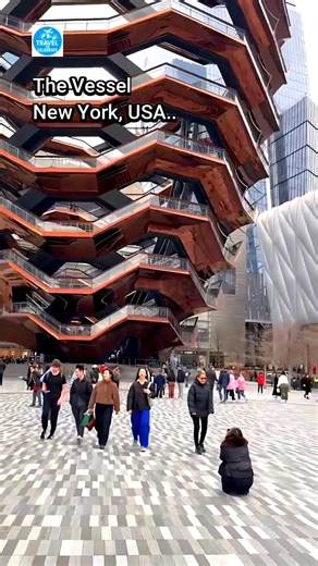 What I Learned from SURVIVING The Vessel's Endless Staircase! Step inside the mesmerizing honeycomb structure of The Vessel in New York City to experience one of the most unique architectural landmarks in the world. Located in the heart of Hudson Yards, this copper-clad masterpiece features a dizzying labyrinth of staircases that offers visitors stunning, interactive views of the Manhattan skyline from every conceivable angle. If you enjoyed this breathtaking view of the Big Apple, please like, 