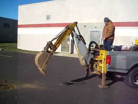 FORD BRADCO BACKHOE in a pickup truck 6500 OBO