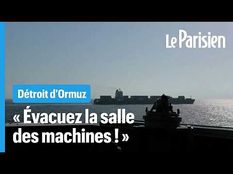 A US destroyer opens fire on an Iranian cargo ship near the Strait of Hormuz