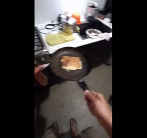Cook flips dropped food back to pan with foot in Venezuela