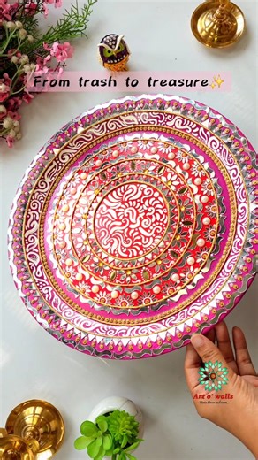Chhaya Meena on Instagram: "Trash to Treasure ✨️😍 Festive makeover A beautiful transformation of my dinner plate that was chipped and unusable for long. In love with this makeover, tried Alpona inspired patterns to add the fusion Materials & Process: - Using melamine plate - A coat of Gesso- Acts as a primer, helps acrylic paints adhere well, enhances the vibrancy of acrylic colors - Using cotton cord 2mm thickness to make circular patterns pop up - Acrylic colors in red n pink hues, with gold 