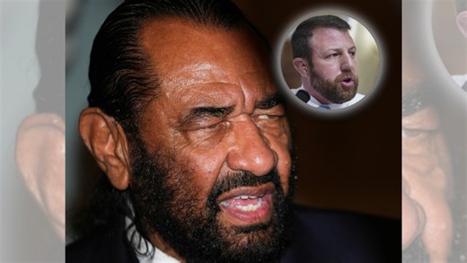 Oklahoma Sen. Markwayne Mullin attempts to grab sign from Rep. Al Green during State of the Union