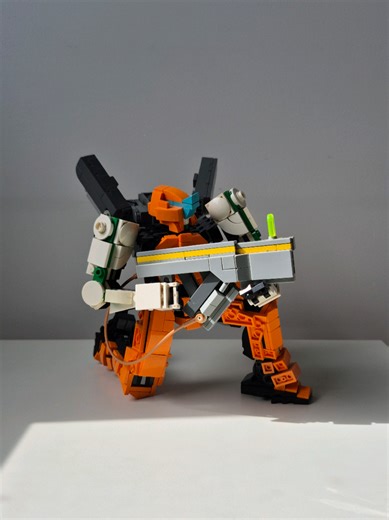 Orange Sentinel Mech Lego MOC Instructions available at Rebrickable. https://reb.li/m/185820 #lego #legomoc #afol #mecha #toy